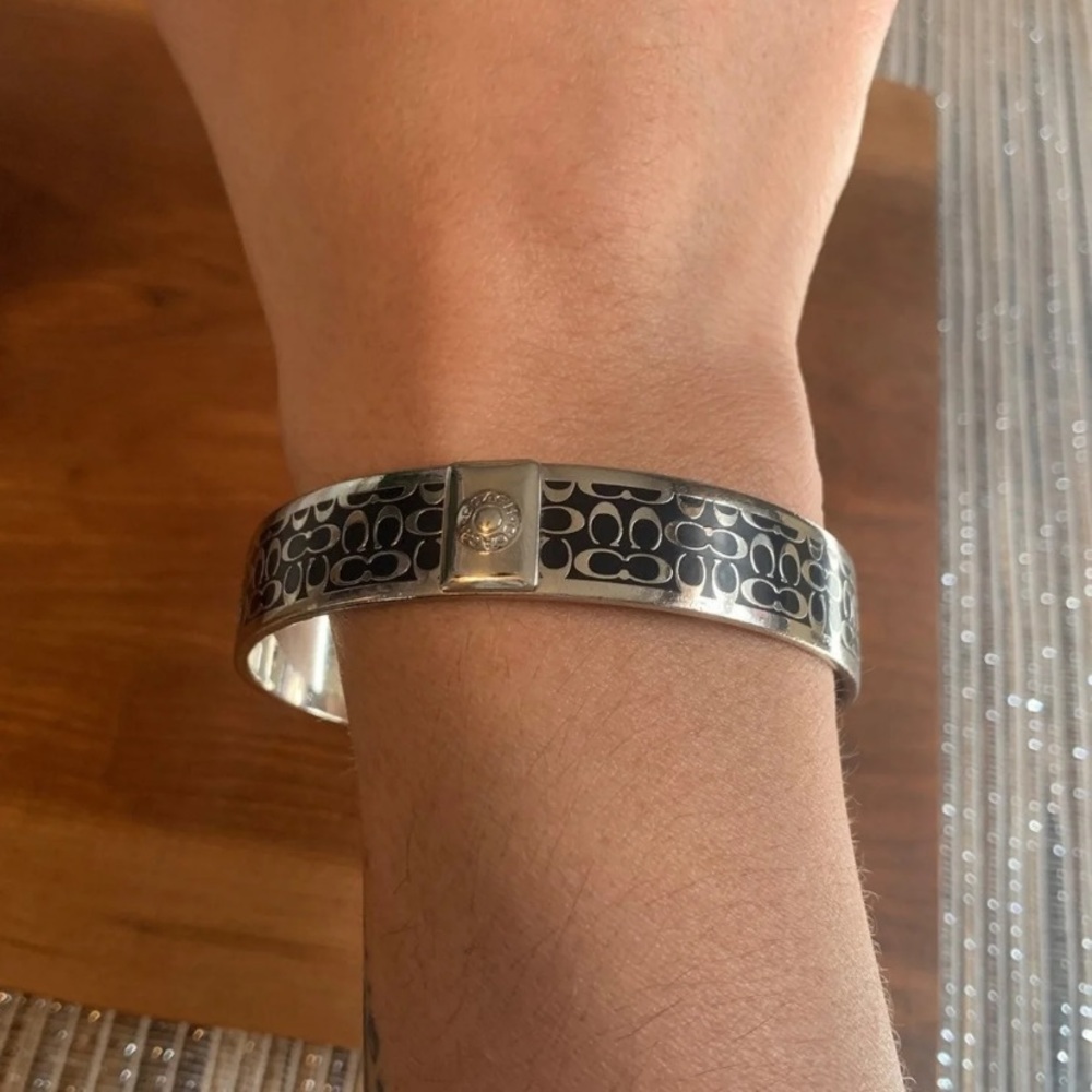 Coach ladies bangle.